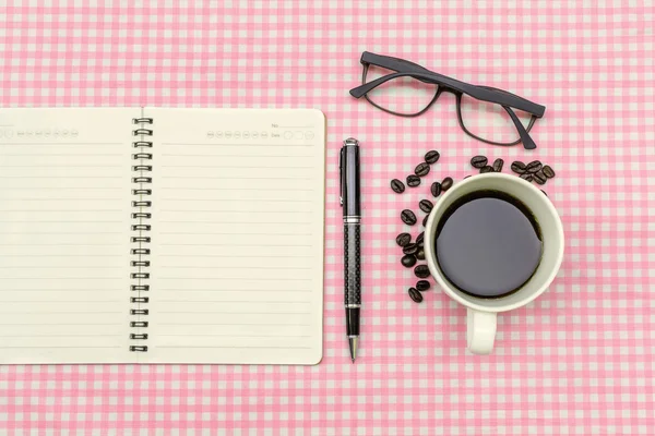 Blank note book with coffee