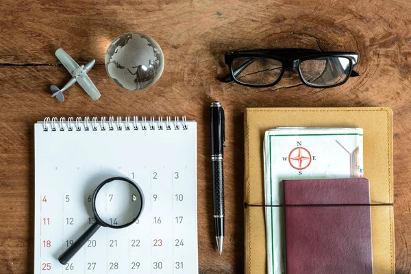 diary, map and calendar with passport