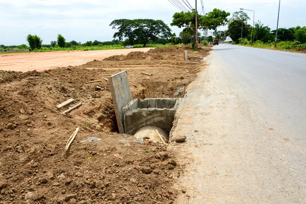 Concrete pipeline construction site — 图库照片