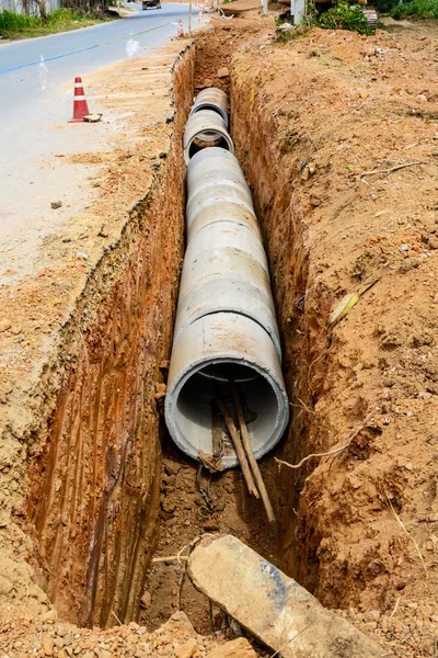 Concrete pipeline construction site — Stock Photo, Image