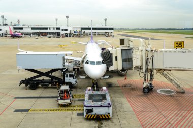 Airplane maintenance checking during refueling and loading bagga
