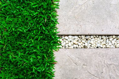 Ornament Stone footpath with pebble and grass