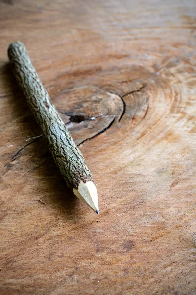 Close up of Branch pencil on old wooden textured — Stock Photo, Image
