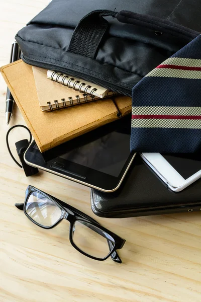 Businessman accessories and notebook bag on desk — Stock Photo, Image