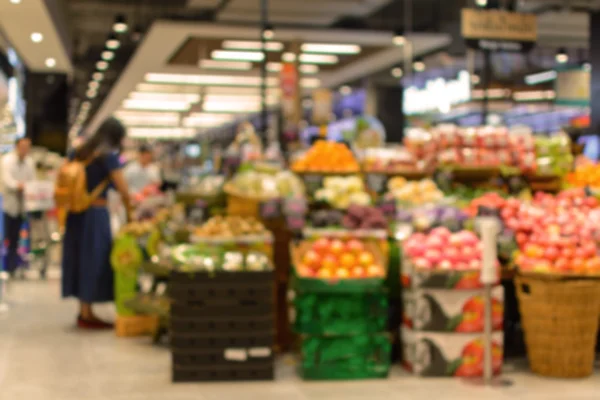 Blur background of people choosing fruits — Stock Photo, Image