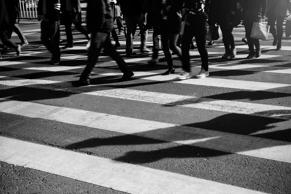 Crowd of people walking on zebra crossing street — Stock Photo, Image