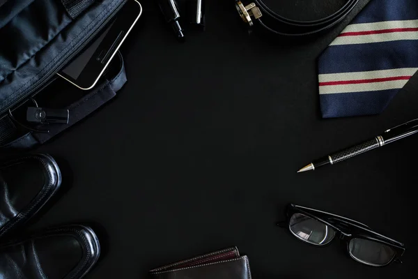 men accessories on black background