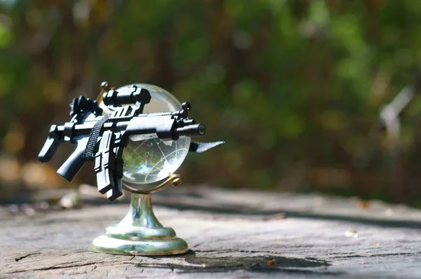 Small Glass Globe Toy Weapons — Fotografia de Stock