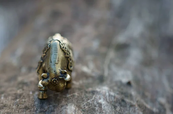 Metal bull figurine close-up. The symbol of 2021.