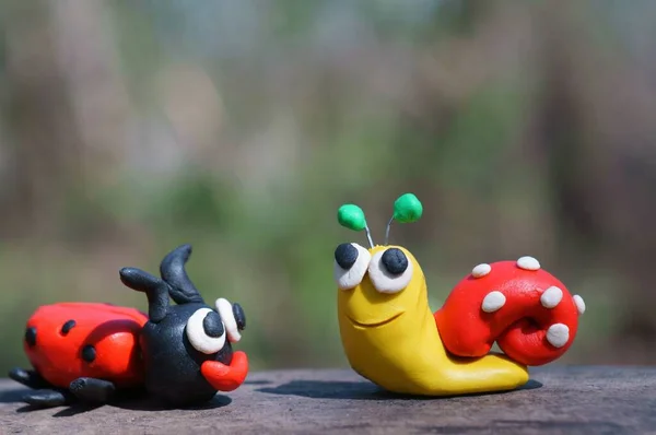 Figurine Snail Ladybug Made Plasticine Wild Flowers Symbol Spring — Stock Photo, Image