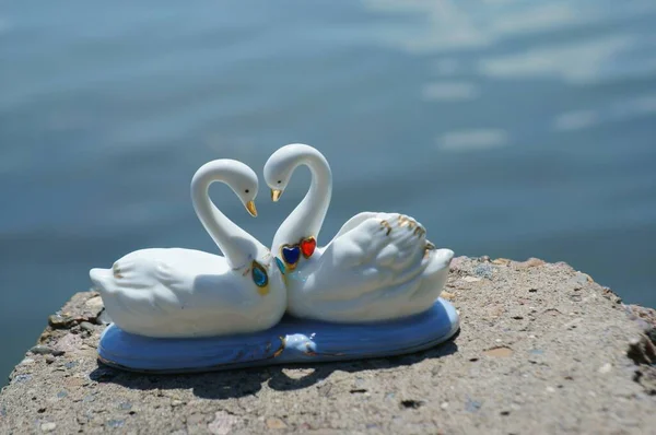 Pair Souvenir Swans Love Blue Background — Stock Photo, Image