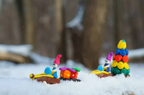 Christmas Figures Snowmobile Made Plasticine Carry Christmas Tree Gifts Action — Stock Photo, Image
