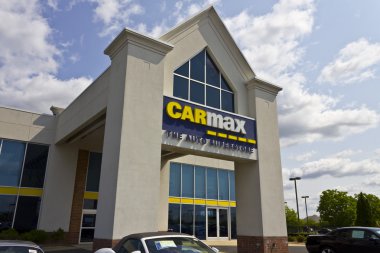 Indianapolis - Circa May 2016: CarMax Auto Dealership. CarMax is the Largest Used-Car Retailer in the US IV clipart