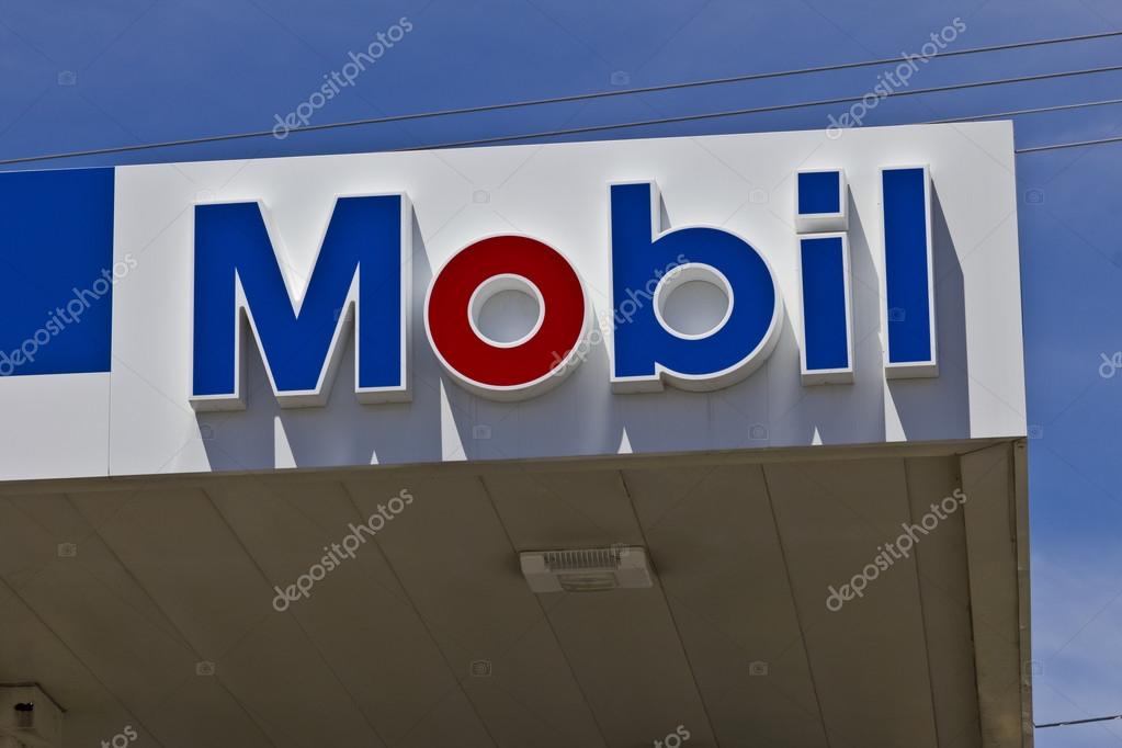 Indianapolis Circa June 2016 Mobil Gas Station Signage. Mobil Merged