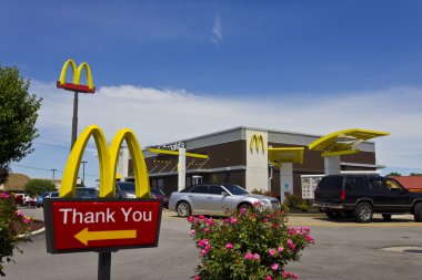 Indianapolis - Circa July 2016: McDonald's Restaurant Location. McDonald's is a Chain of Hamburger Restaurants V clipart