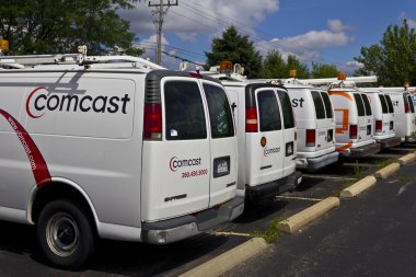 Lafayette, IN - Circa July 2016: Comcast Service Vehicles. Comcast is a Multinational Mass Media Company IV clipart