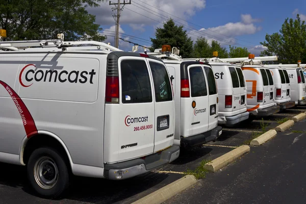 Lafayette, IN - Circa July 2016: Comcast Service Vehicles. Comcast is a Multinational Mass Media Company IV