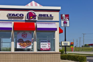 Ft. Wayne, IN - Circa July 2016: Combination Taco Bell and Kentucky Fried Chicken Location. Taco Bell and KFC are Subsidiaries of Yum! Brands I clipart