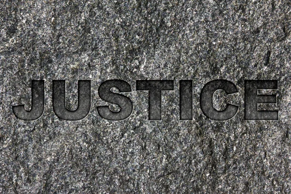 Justice Etched Bold Dark Gray Text Black Granite — Stock Photo, Image