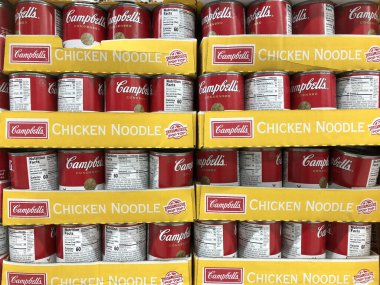 Campbell's Chicken Noodle Soup display. If someone isn't feeling well, Campbell's Chicken Noodle Soup is the ultimate comfort food. clipart