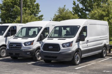 Indianapolis - Circa May 2021: Ford Transit display at a CarMax Auto Dealership. CarMax is the largest used and pre-owned car retailer in the US. clipart