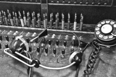 Closeup of a Vintage Bell System Telephone Switchboard with Plugs IV clipart
