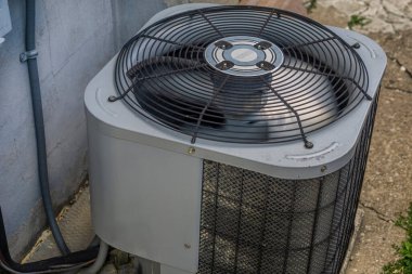 Heating and air conditioner device outside a house clipart