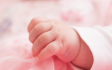 Cute newborn hand, pink color clipart