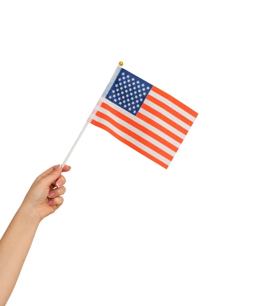 Weibliche Hand hält amerikanische Flagge isoliert auf weißem Hintergrund — Stockfoto