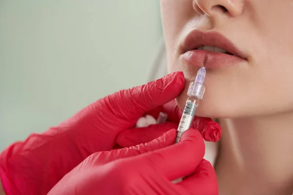 Close up view of lip Augmentation. Woman Getting Beauty Injection For Lips — Stock Photo, Image