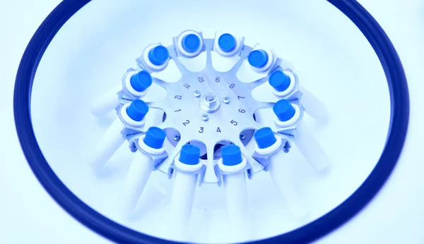 Blood in centrifuge. Platelet-Rich plasma preparation. Tubes with blood in Centrifuge. Blue tonned image — Stock Photo, Image