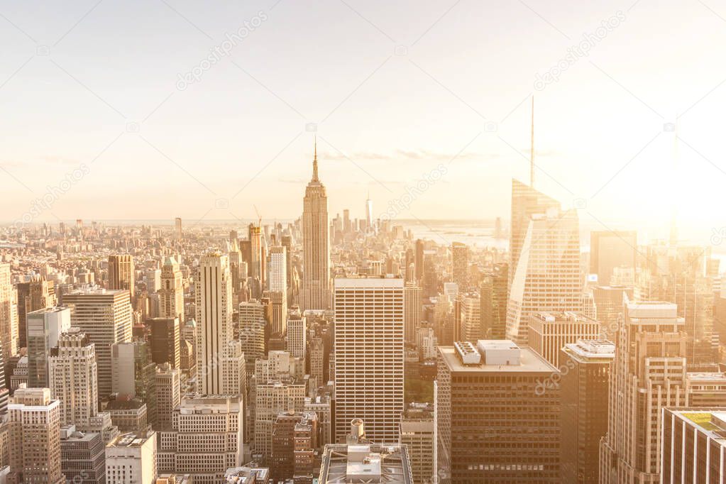 New York City Manhattan midtown aerial panorama view with skyscrapers, sepia sunset toning