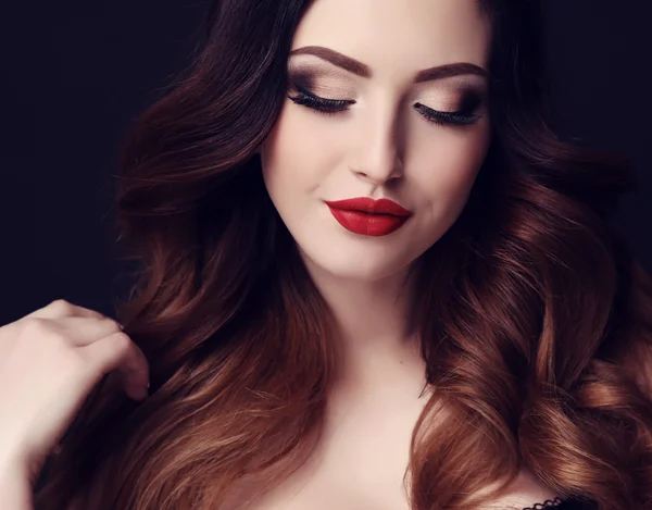 Gorgeous sexy woman with dark hair and bright makeup — Stock Photo, Image