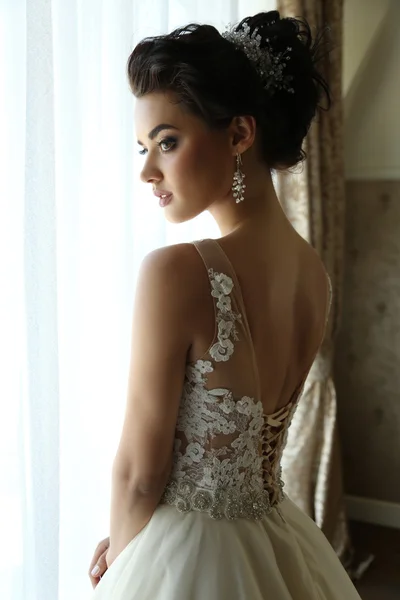 Gorgeous bride in luxurious wedding dress — Stock Photo, Image