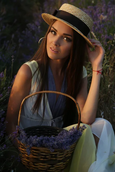 Gorgeous sensual woman with dark long hair in elegant outfit — Stock Photo, Image