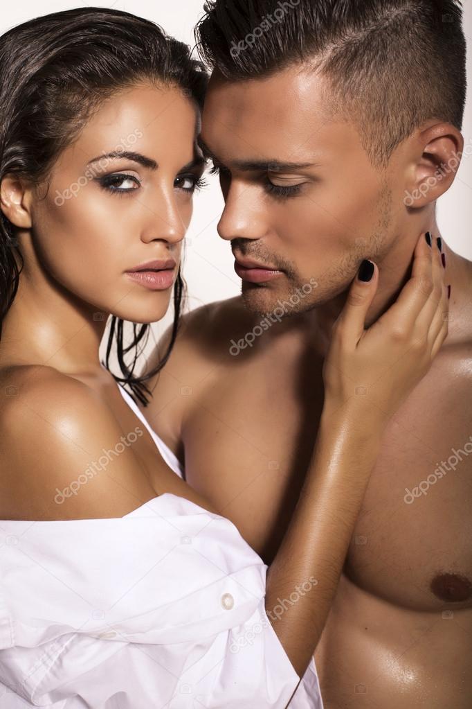 sexy impassioned couple posing in studio 