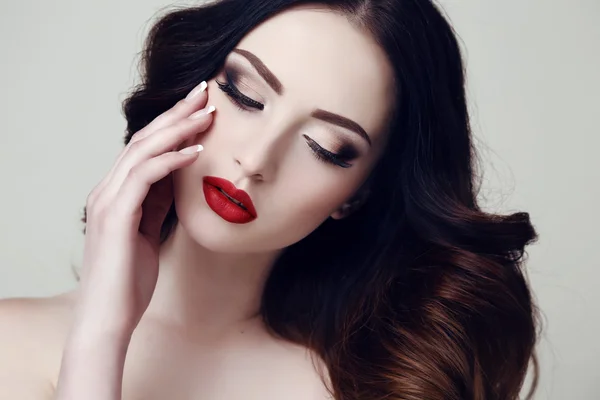 Beautiful sexy woman with dark hair and bright makeup — Stock Photo, Image