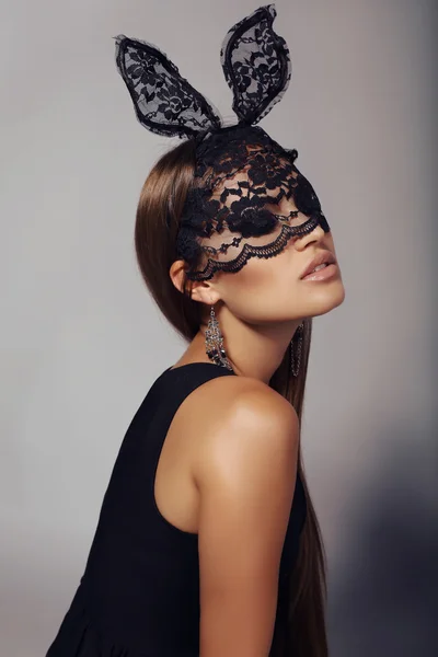 Beautiful sexy woman with long dark hair in lace bunny mask — Stock Photo, Image