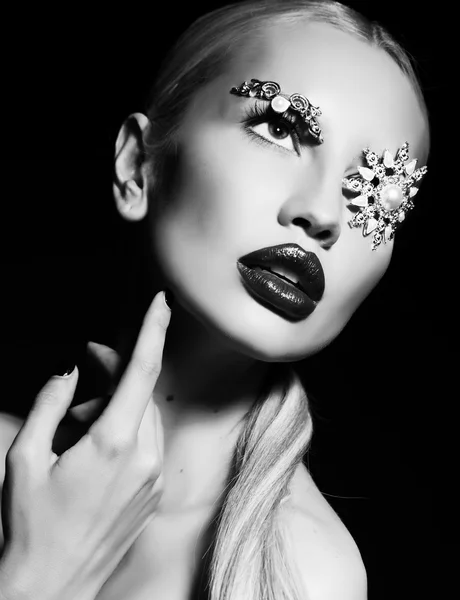 Sexy blond woman with fantastic makeup with bijou accessories — Stock Photo, Image