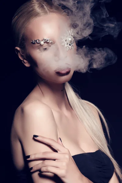 Sexy blond woman with fantastic makeup with bijou accessories — Stock Photo, Image