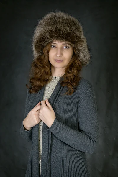 Portrait of a girl in a fur hat — Stock Photo, Image