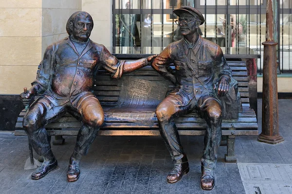 Bronze sculpture of two old friends in old town of Tbilisi Georgia