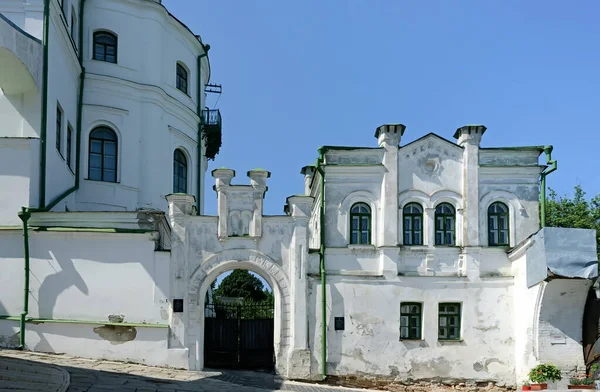 Ordinary white building with support piers of Kyiv Pechersk Lavra in Ukraine