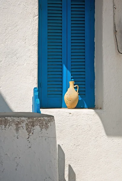 Clay pot on window sill — Stock Photo, Image