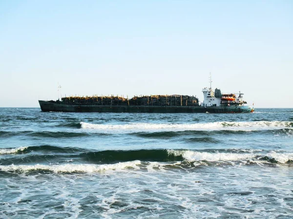 Dry cargo ship transporting wood over the Black Sea