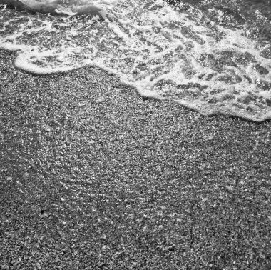 Deniz kıyısına atılan bir dalga, doğal arka plan. 