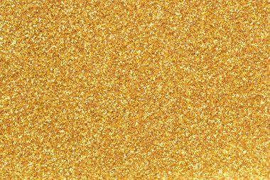 Shiny gold glitter texture with sparkling light reflections, perfect for luxury design