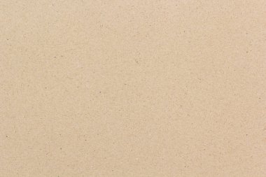 Kahverengi geri dönüştürülmüş kağıt doku arkaplanının yakın plan görüntüsü