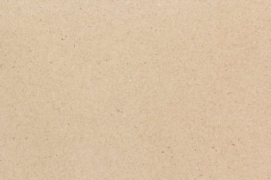 Görünür liflerle bej geri dönüştürülmüş kağıt dokusu ve ince lekeler doğal kaba bir yüzey oluşturuyor.