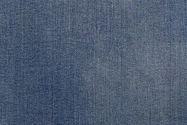 Mavi kot kumaş dokusunu ince dokuma desenli ve doğal pamuklu kumaşla kapatın.